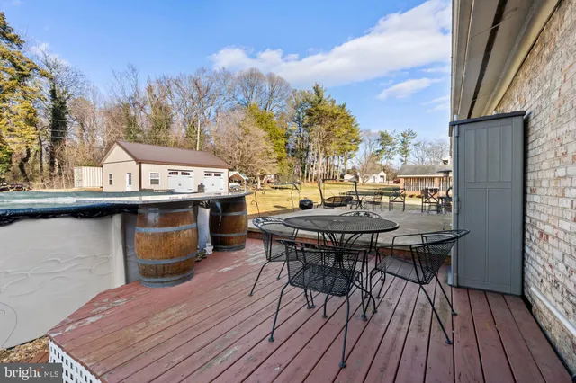 a view of a swimming pool with a lounge chairs