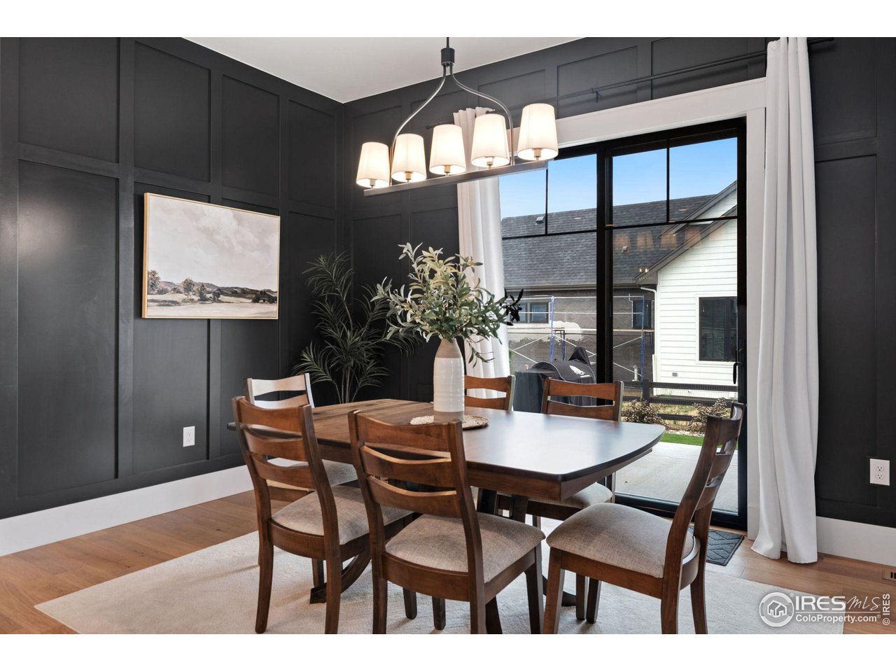 6475 Sanctuary Drive Windsor, CO 80550 - Photo 7 of 37 a dining room with furniture and window