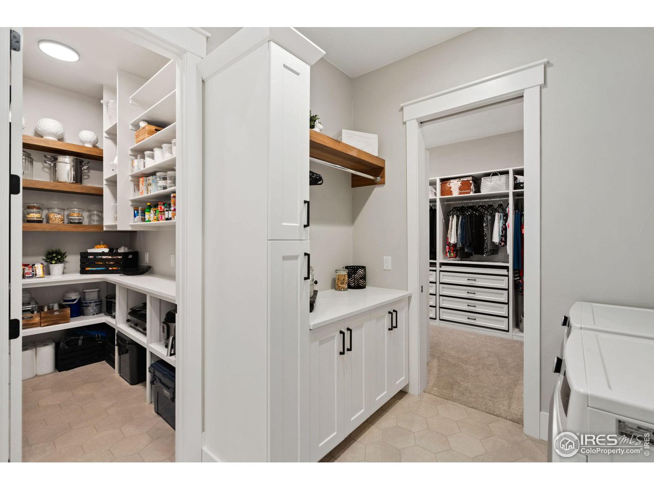 6475 Sanctuary Drive Windsor, CO 80550 - Photo 10 of 37 a kitchen with cabinets and appliances
