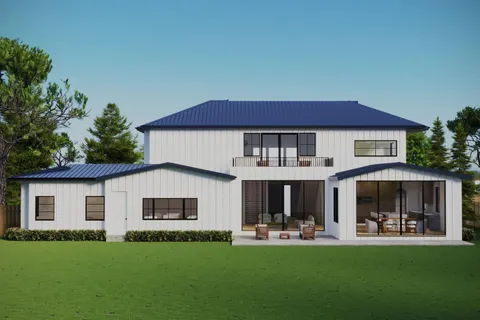 a view of a house with a yard and sitting area