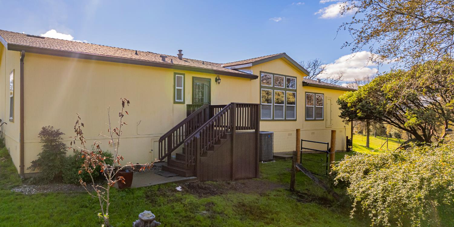 3335 Wildcat Road Mariposa, CA 95338 - Photo 43 of 48 a view of a house with a yard