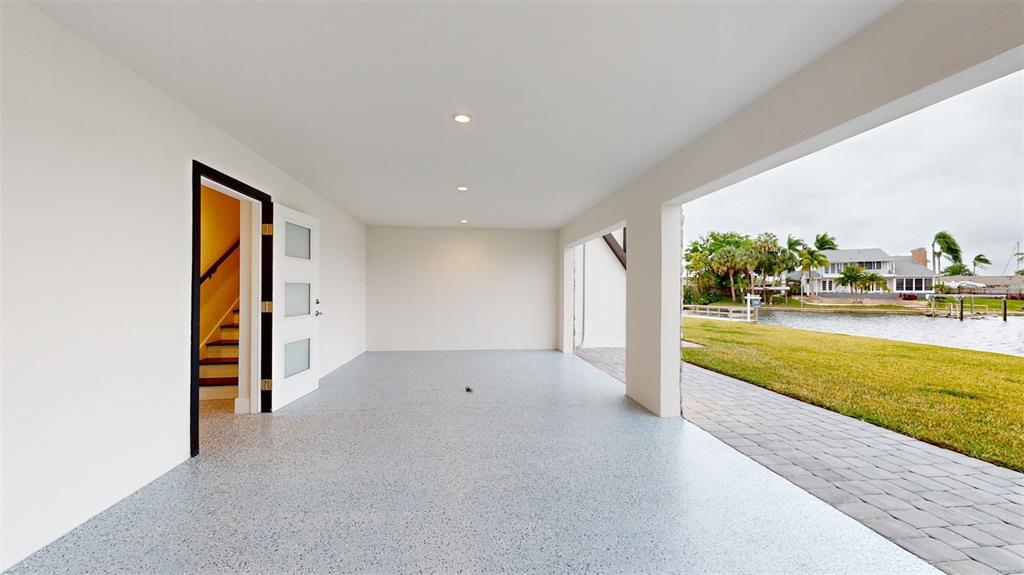 772 Gran Kaymen Way Apollo Beach, FL 33572 - Photo 33 of 43 a view of a living room and floor to ceiling window