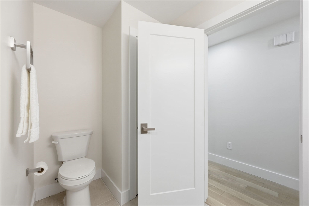 46 Horseshoe Circle Ware, MA 01082 - Photo 26 of 36 a white toilet sitting next to a small bathroom