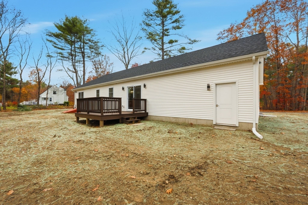 46 Horseshoe Circle Ware, MA 01082 - Photo 28 of 36 a house with trees in front of it