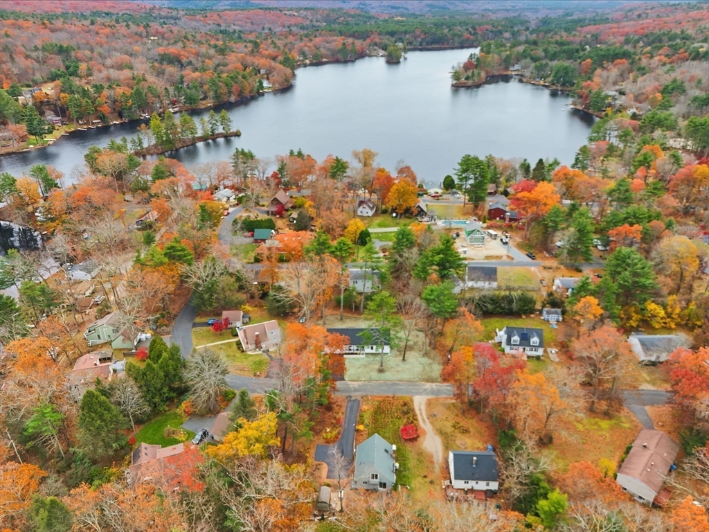 46 Horseshoe Circle Ware, MA 01082 - Photo 35 of 36 an aerial view of city and lake with trees all around