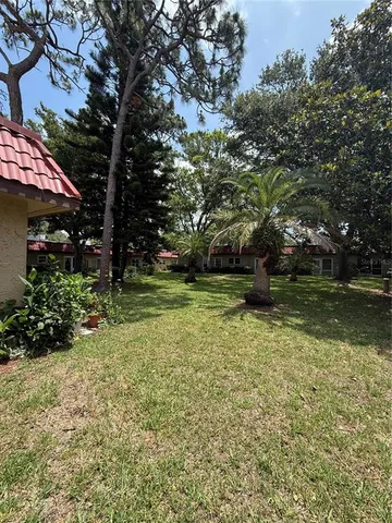 a view of a backyard with a garden