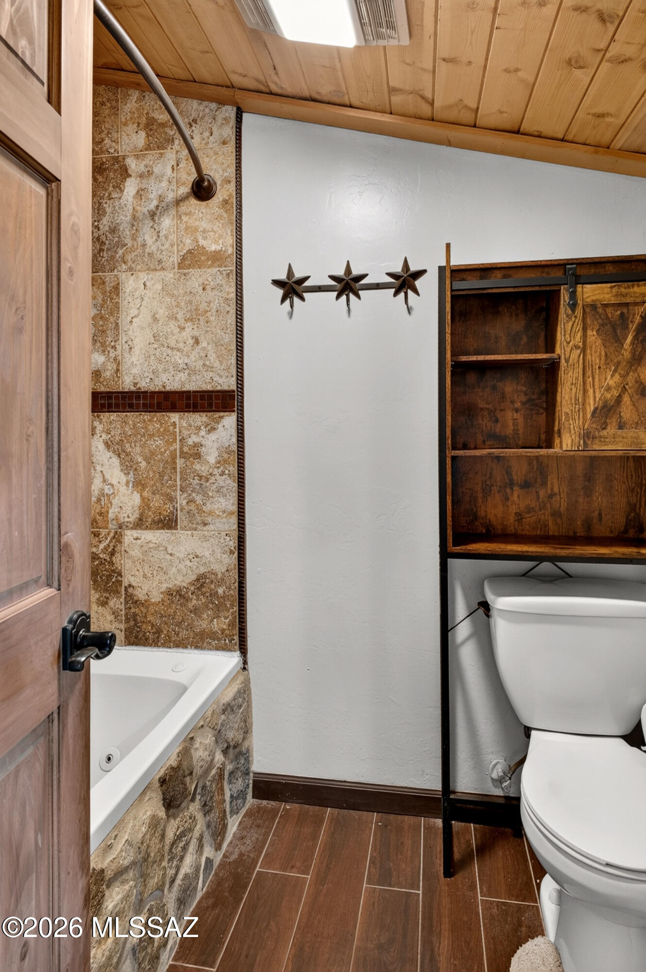531 South Cody Loop Road Oracle, AZ 85623 - Photo 31 of 38 a bathroom with a toilet and a shower