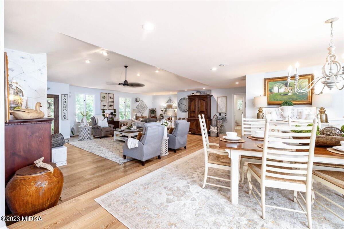 724 Forest Hill Road Macon, GA 31210 - Photo 1 of 46 a living room with furniture and a flat screen tv