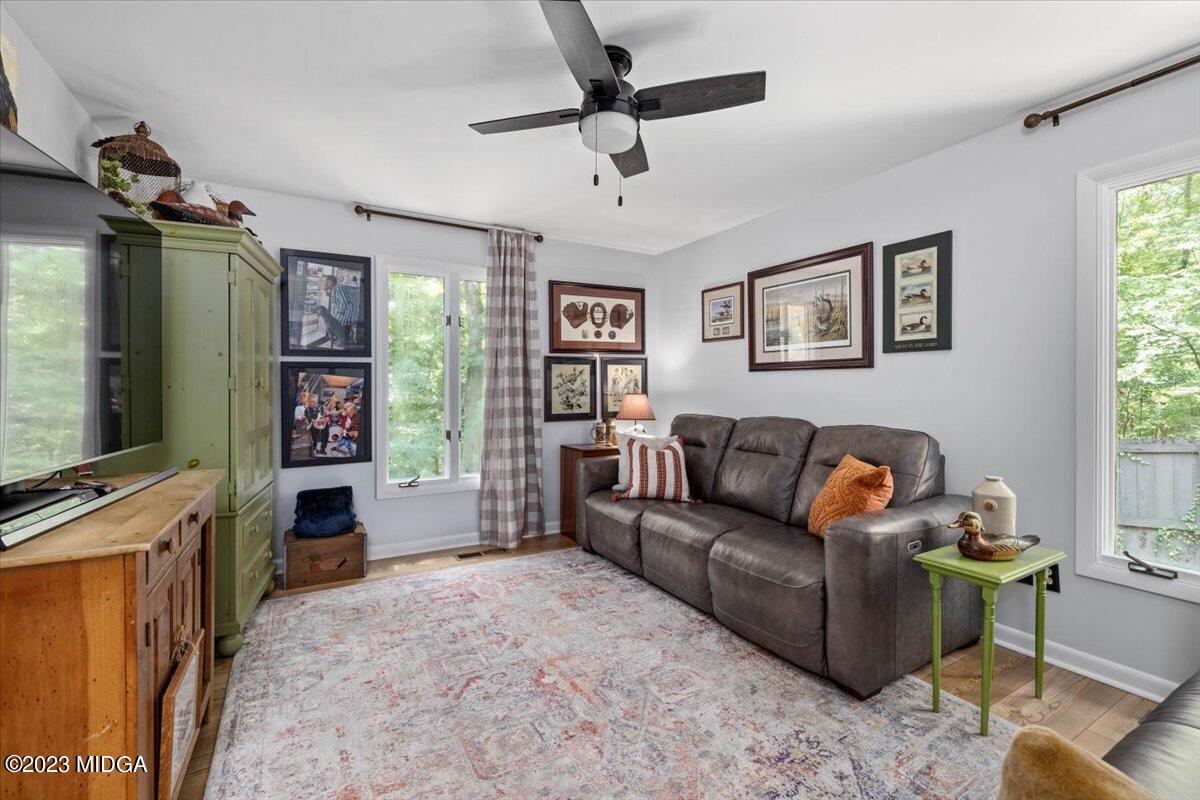 724 Forest Hill Road Macon, GA 31210 - Photo 20 of 46 a living room with furniture and a flat screen tv