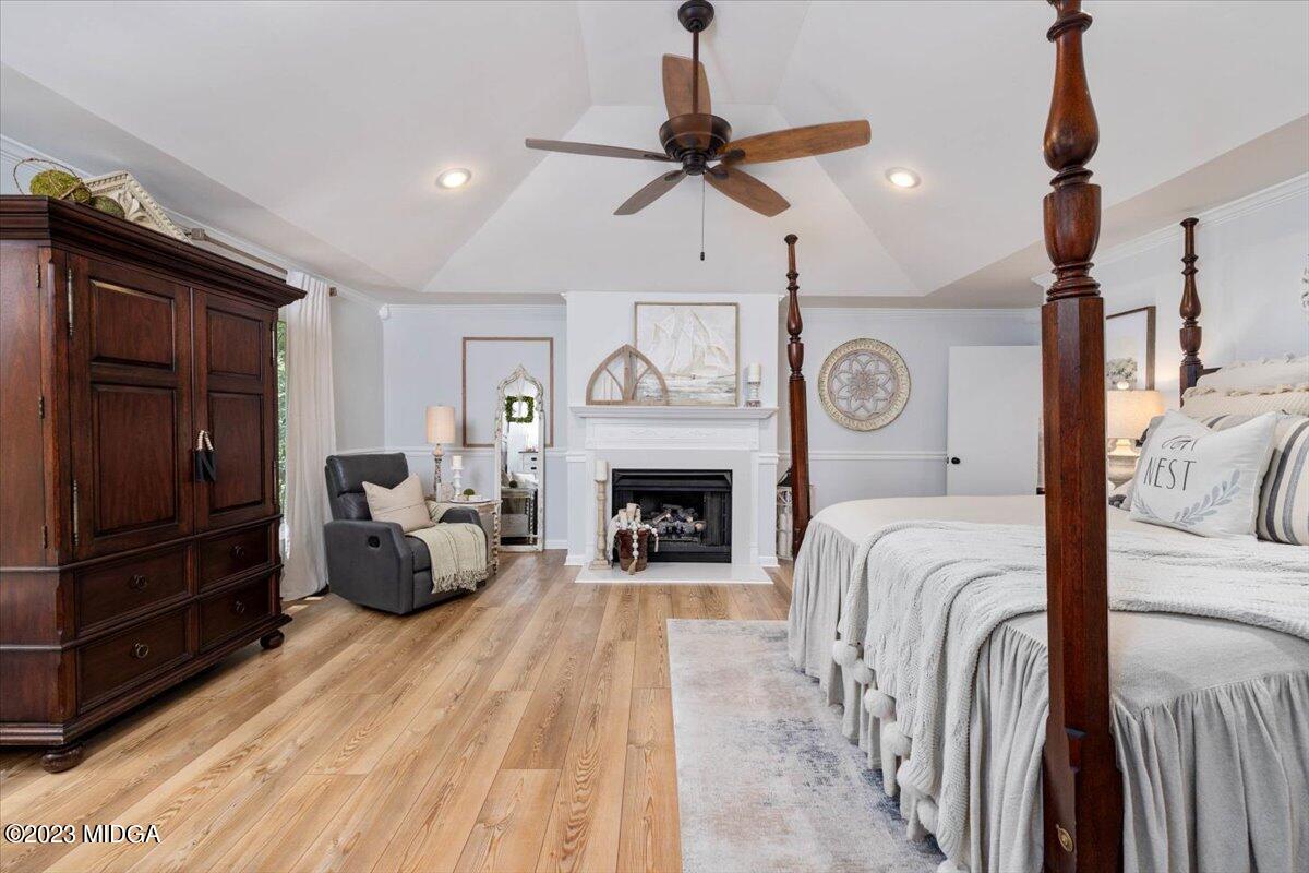 724 Forest Hill Road Macon, GA 31210 - Photo 23 of 46 a living room with furniture and a fireplace