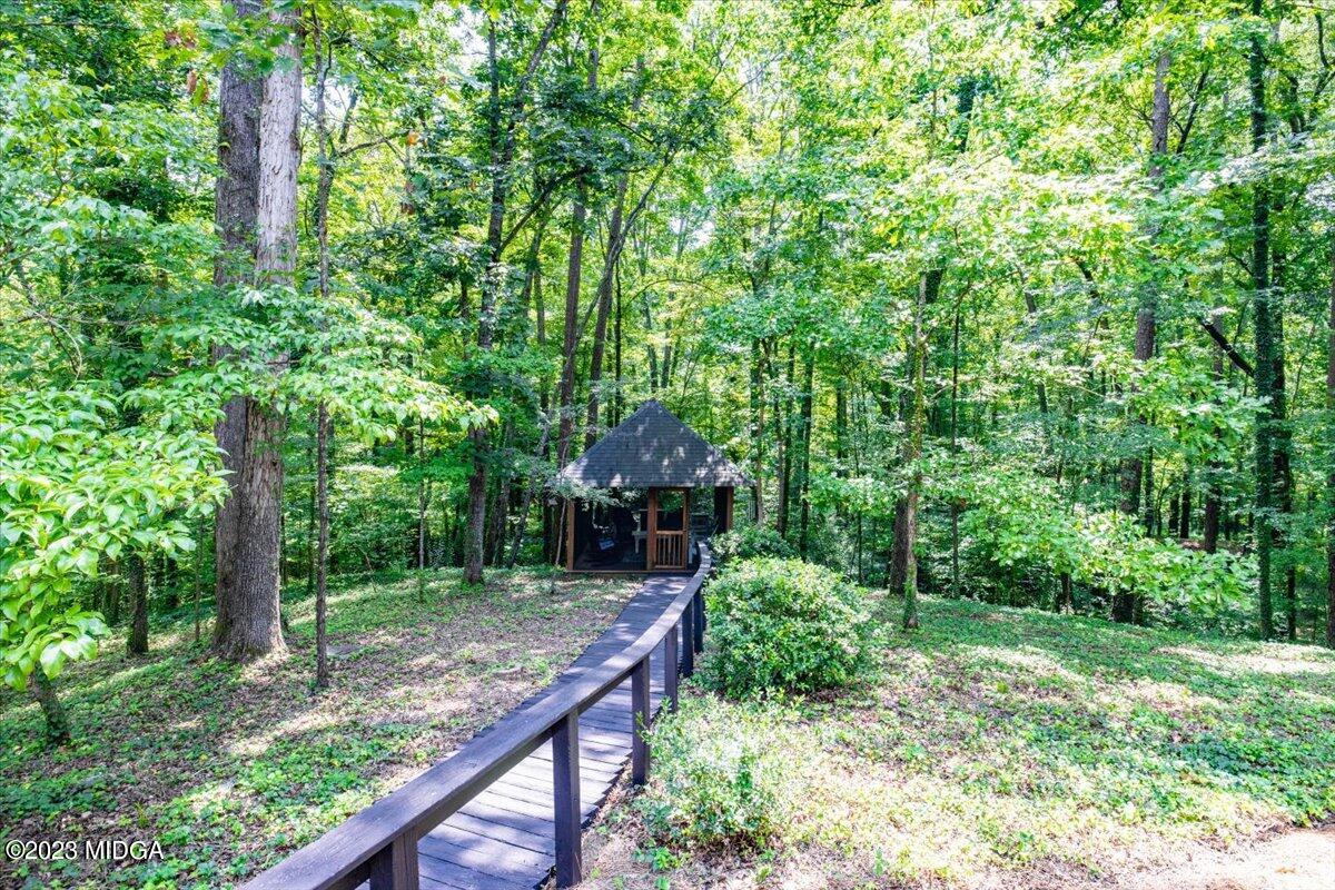 724 Forest Hill Road Macon, GA 31210 - Photo 36 of 46 a garden view with a seating space