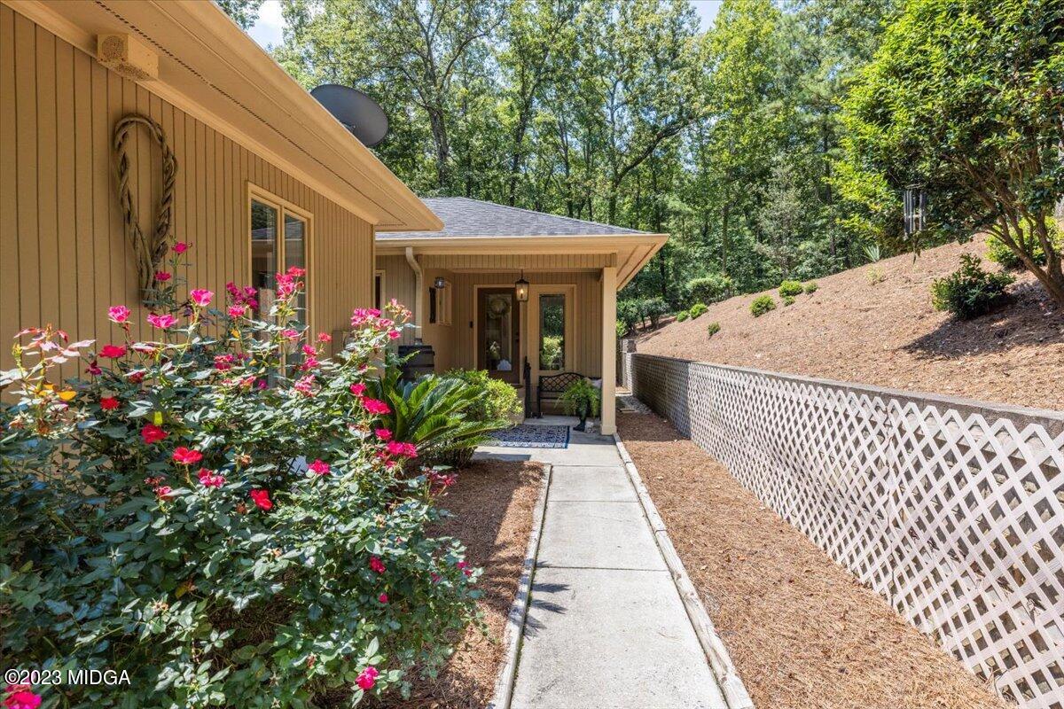 724 Forest Hill Road Macon, GA 31210 - Photo 41 of 46 a garden view with a seating space