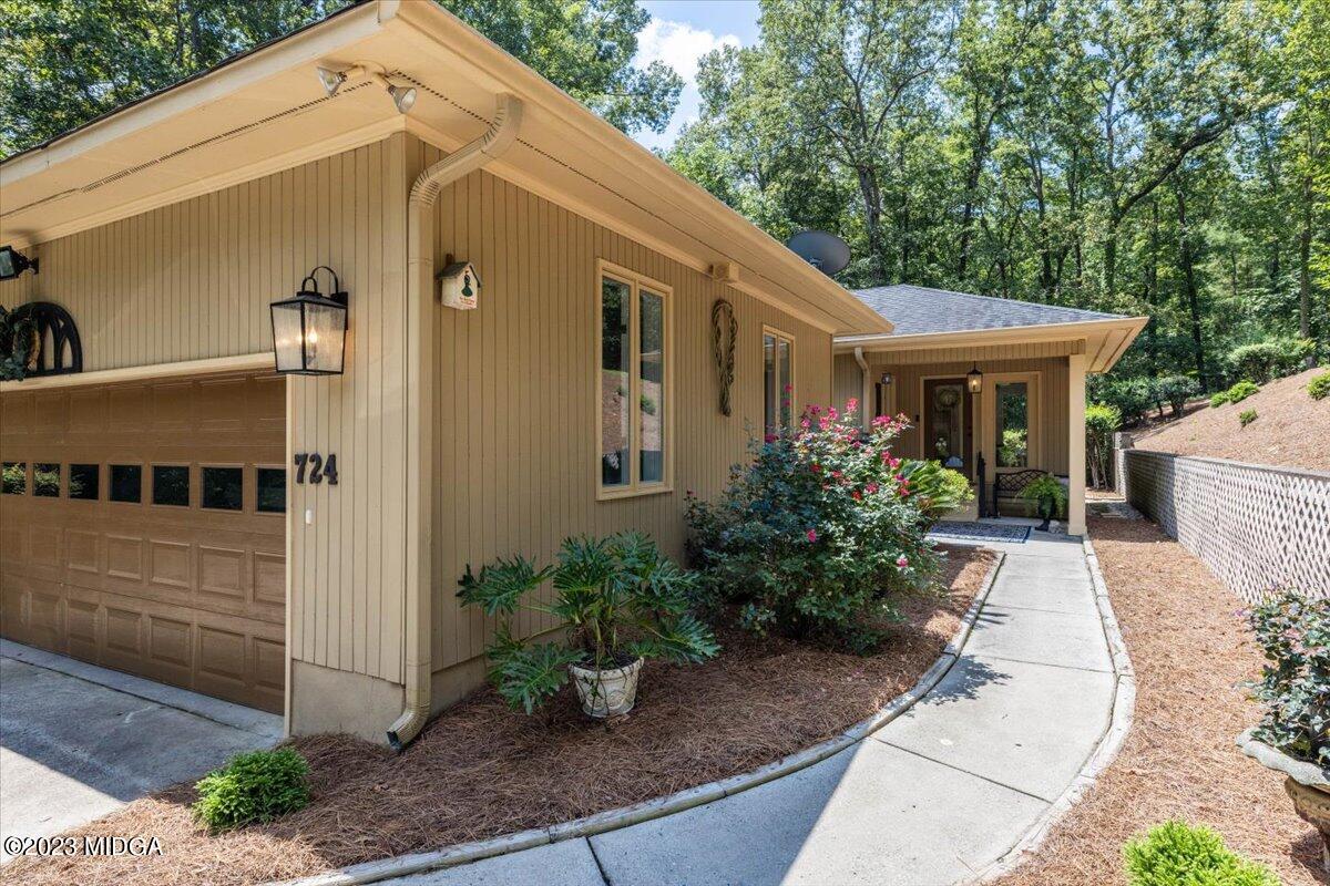 724 Forest Hill Road Macon, GA 31210 - Photo 42 of 46 a front view of a house with garden