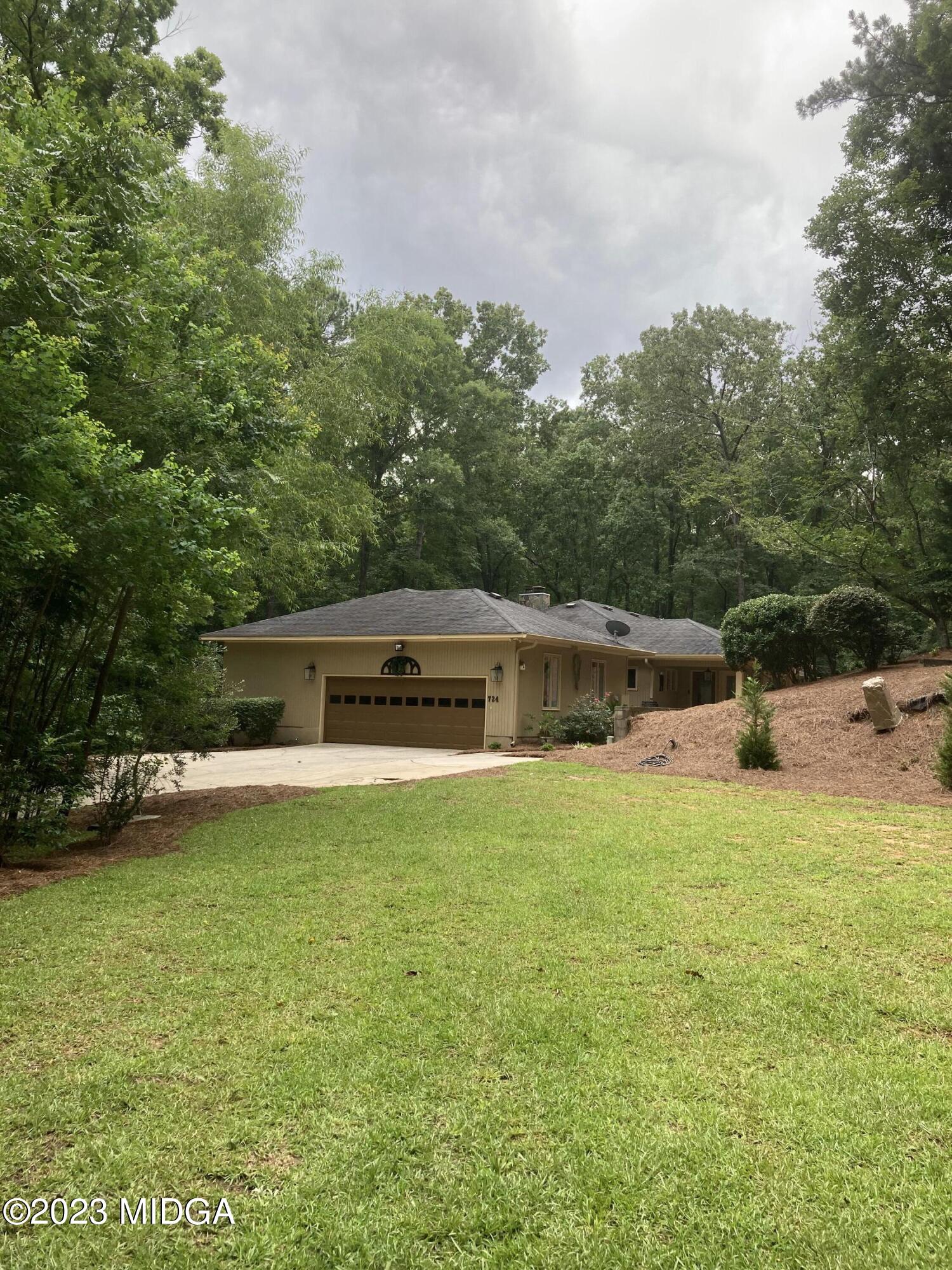 724 Forest Hill Road Macon, GA 31210 - Photo 46 of 46 a front view of a house with a yard