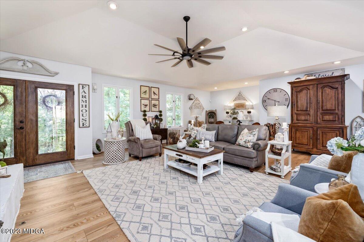 724 Forest Hill Road Macon, GA 31210 - Photo 5 of 46 a living room with furniture ceiling fan and a rug