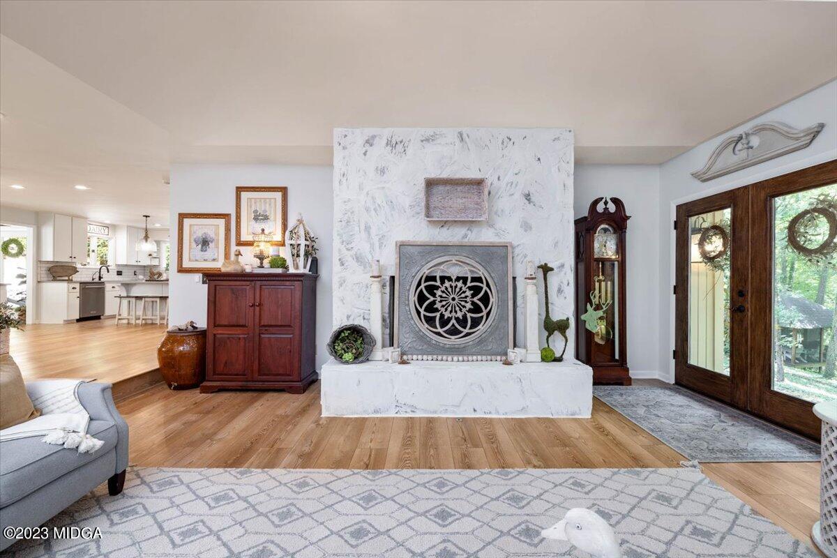 724 Forest Hill Road Macon, GA 31210 - Photo 8 of 46 a living room with furniture and a rug