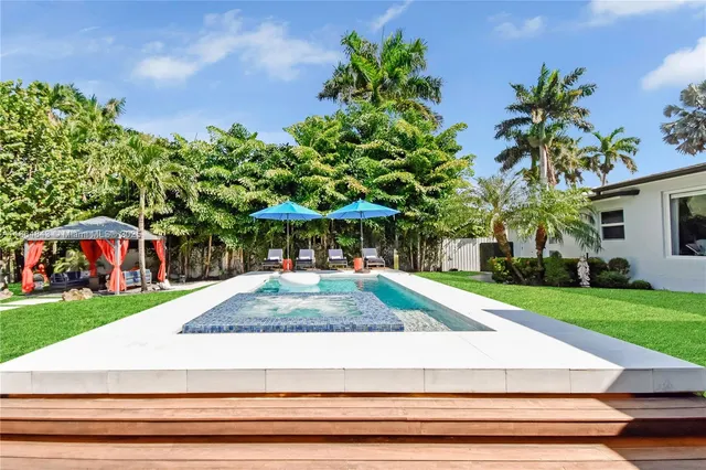 a outdoor living space with furniture and garden view