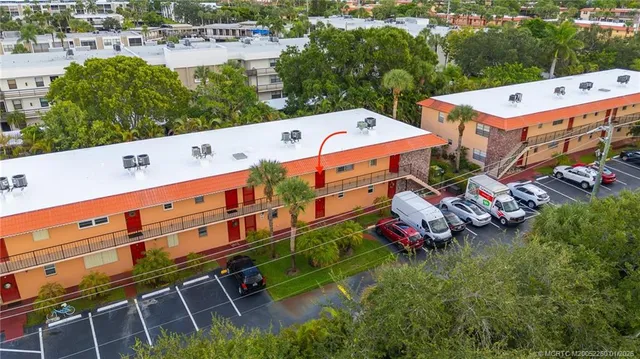 a view of a back yard with an outdoor space