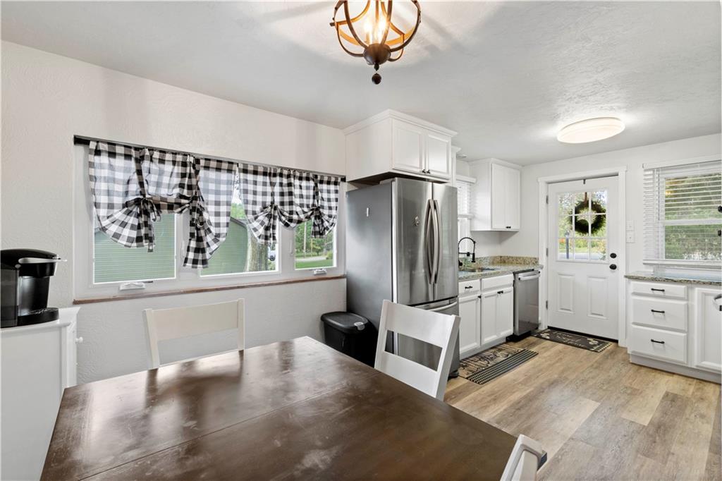 12680 Veronica Lane Irwin, PA 15642 - Photo 11 of 29 a kitchen with stainless steel appliances a refrigerator sink and cabinets