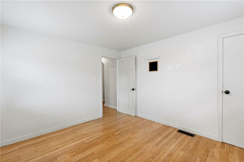 12680 Veronica Lane Irwin, PA 15642 - Photo 16 of 29 a view of empty room with wooden floor