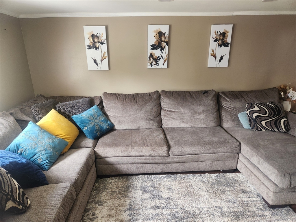 53 Temple Street Spencer, MA 01562 - Photo 14 of 20 a living room with furniture and a couch