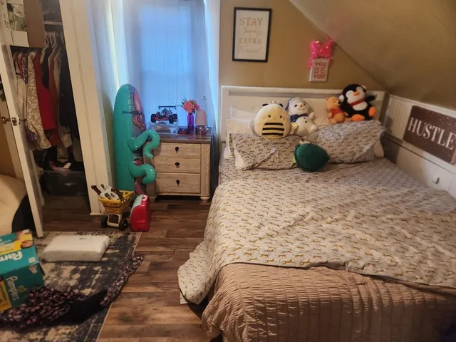 a room with window and air hockey table