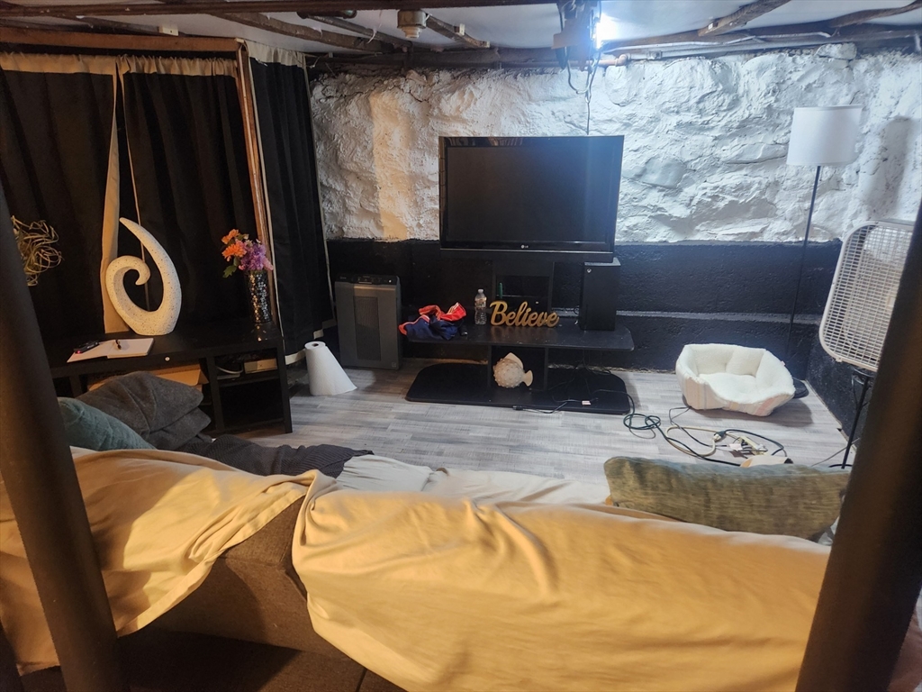 53 Temple Street Spencer, MA 01562 - Photo 20 of 20 a bathroom with a sink mirror vanity and toilet