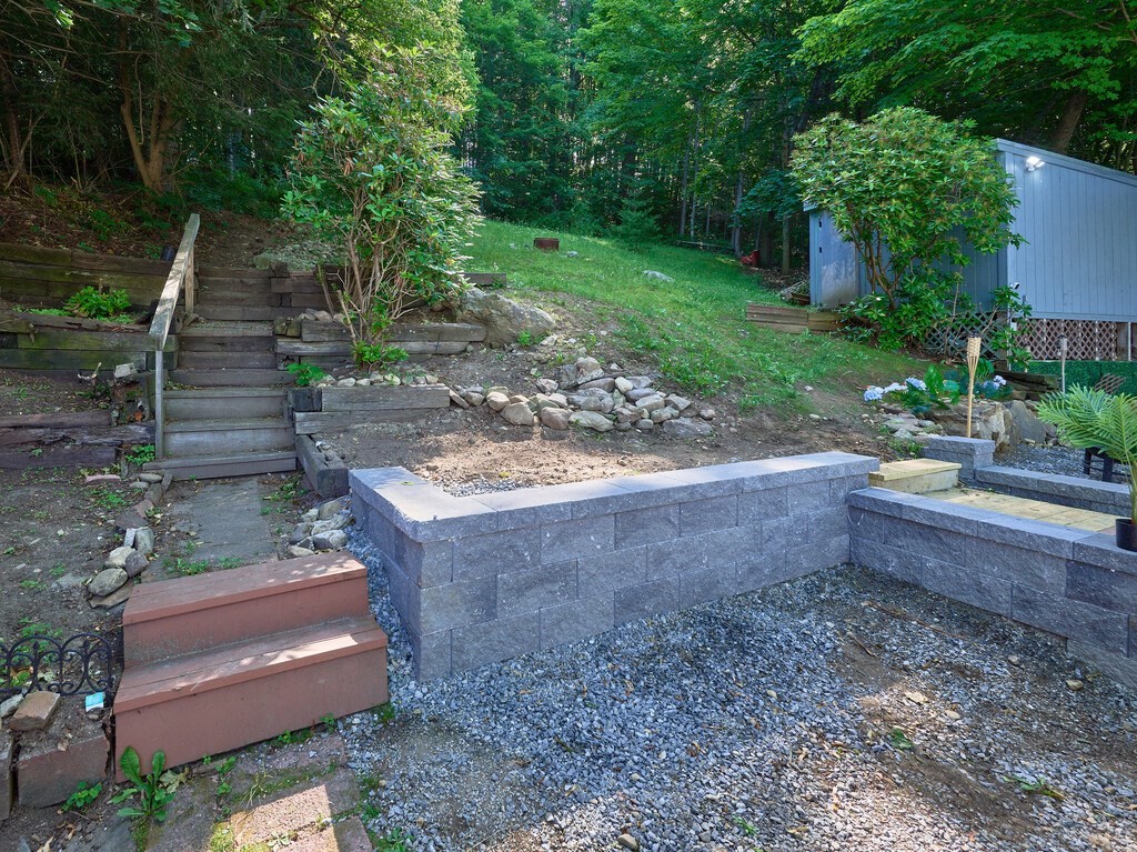 53 Temple Street Spencer, MA 01562 - Photo 7 of 20 a backyard of a house with lots of green space