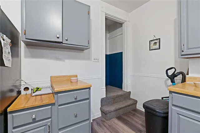 a bedroom with a bed and a table in it