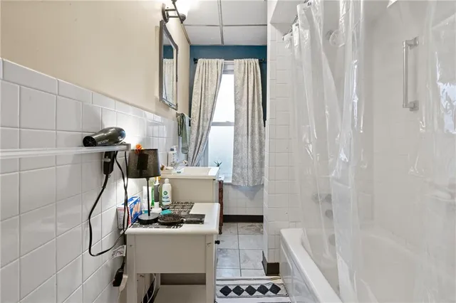 a bathroom with a sink and a bathtub