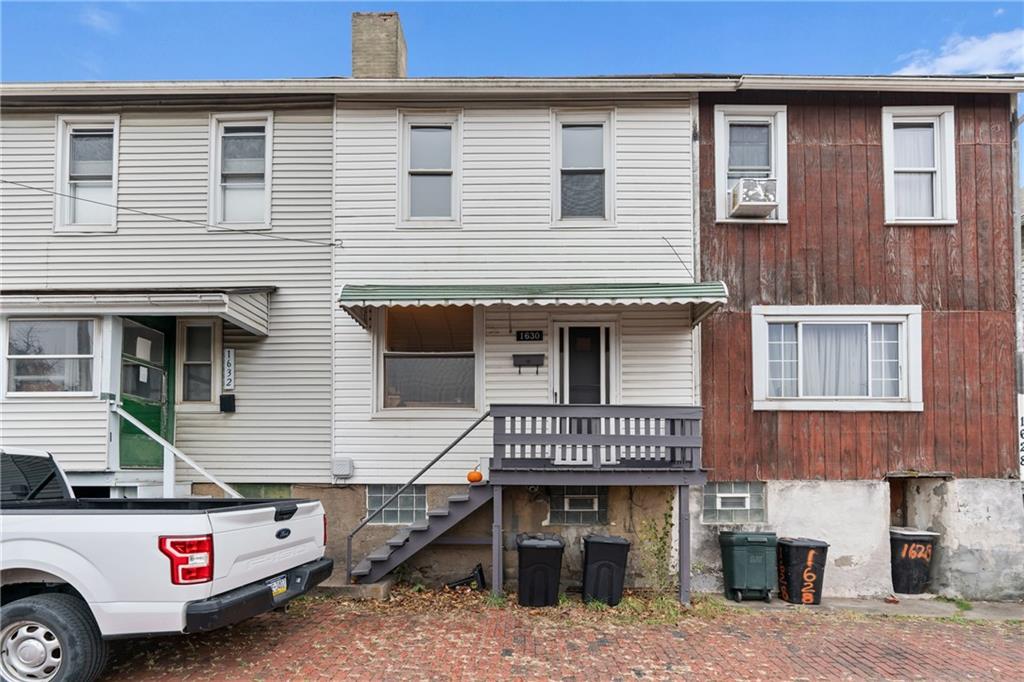 1630 Poplar Avenue Braddock, PA 15104 - Photo 2 of 25 a front view of a house with entryway