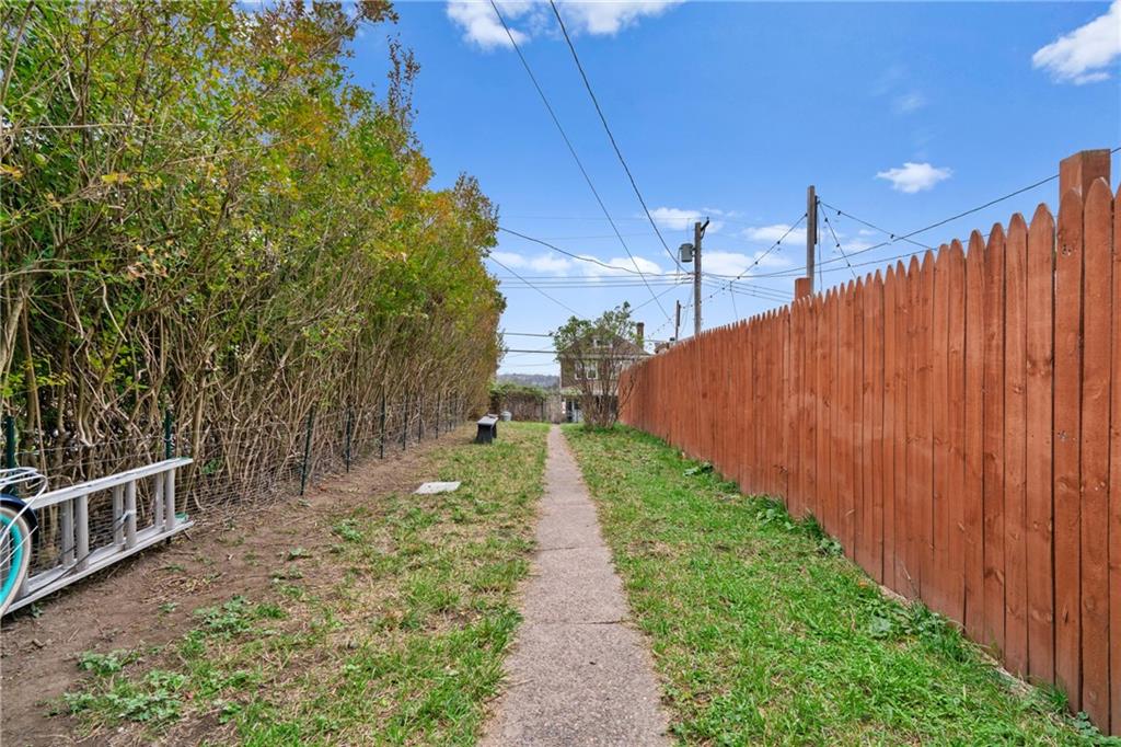 1630 Poplar Avenue Braddock, PA 15104 - Photo 23 of 25 a view of a pathway with a backyard