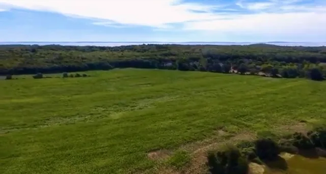 a view of lake and mountain