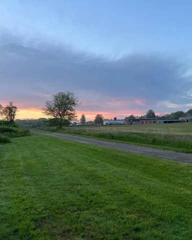 a view of yard with outdoor seating