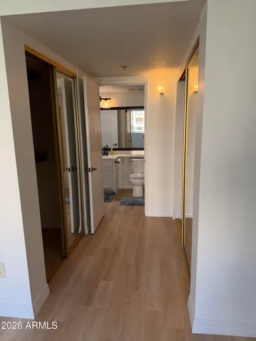 a view of a kitchen from the hallway