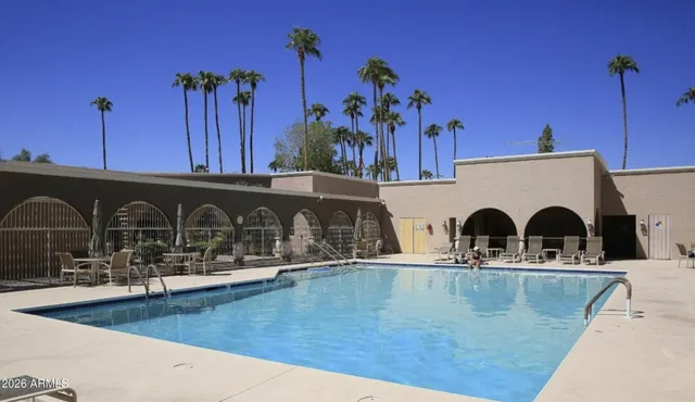 a view of a swimming pool with a fireplace