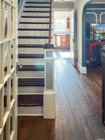 a view of entryway with wooden floor