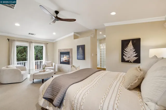 a bedroom with furniture and a window