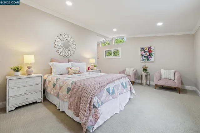a view of a livingroom with workspace and a couch