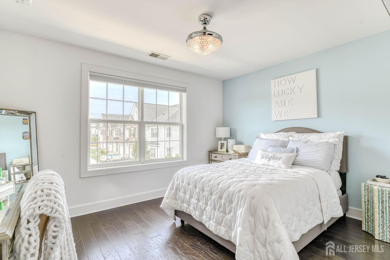 1529 Paxton Lane Monroe Township, NJ 08831 - Photo 18 of 36 a bedroom with a bed and a window