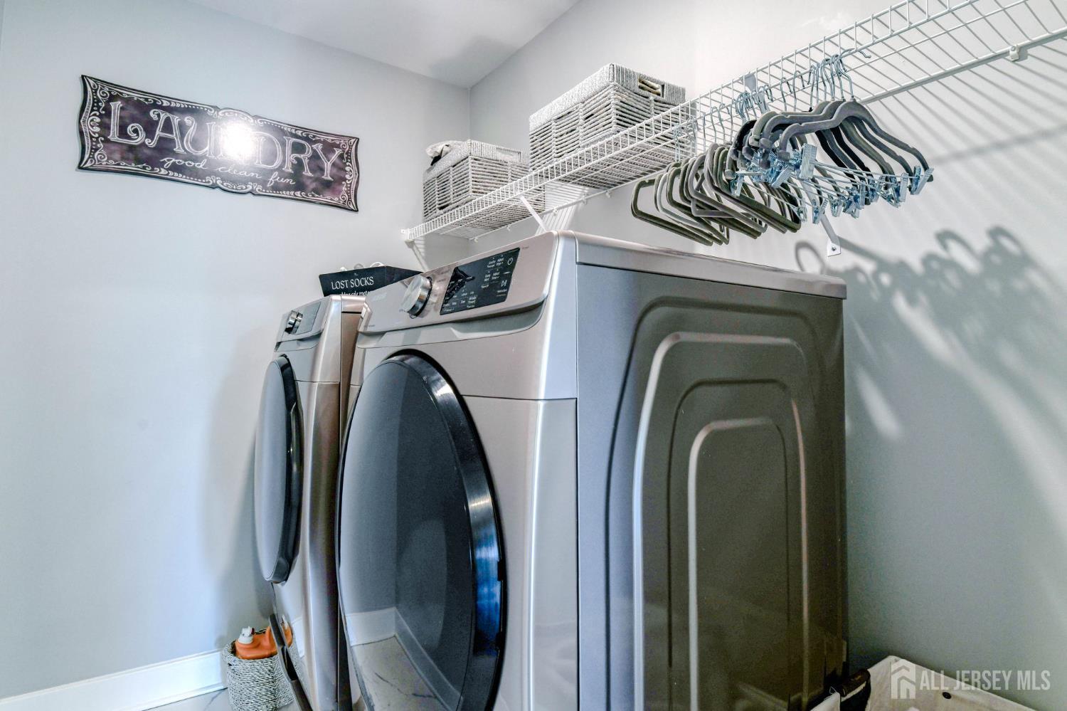 1529 Paxton Lane Monroe Township, NJ 08831 - Photo 19 of 36 a view of small space with washer and dryer