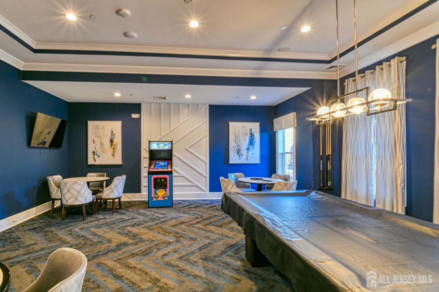 1529 Paxton Lane Monroe Township, NJ 08831 - Photo 29 of 36 a living room with furniture pool table and a large window