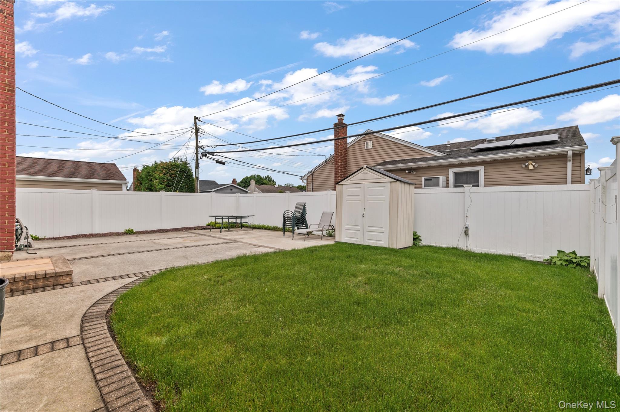 3 Cheshire Road Bethpage, NY 11714 - Photo 24 of 26 a view of a back yard
