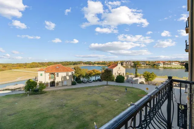 a view of a lake with a city