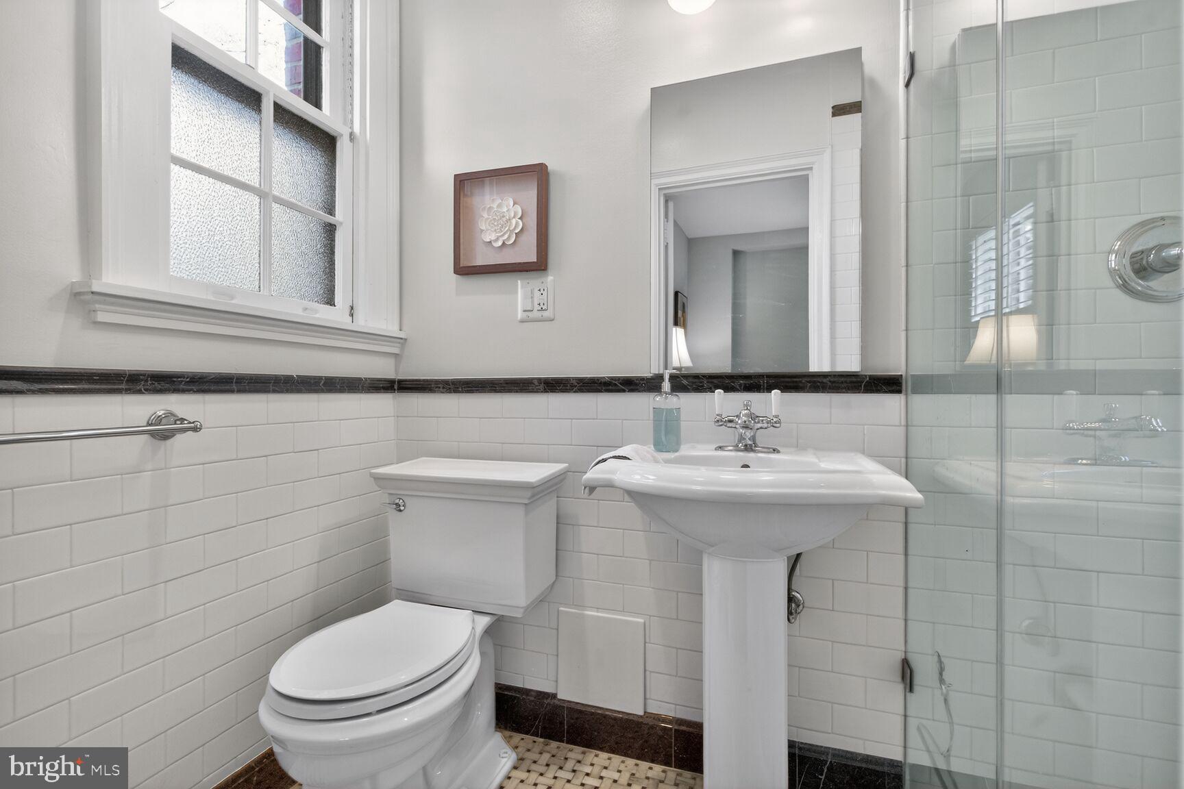 3020 Tilden Street Northwest, Unit 101 Washington, DC 20008 - Photo 15 of 21 Totally renovated primary en-suite bath
