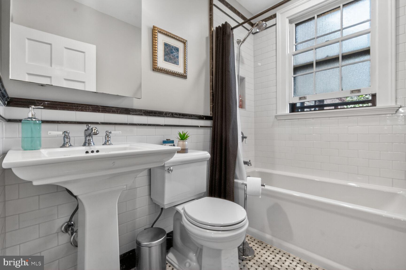 3020 Tilden Street Northwest, Unit 101 Washington, DC 20008 - Photo 18 of 21 Hall bath also has had recent full renovation