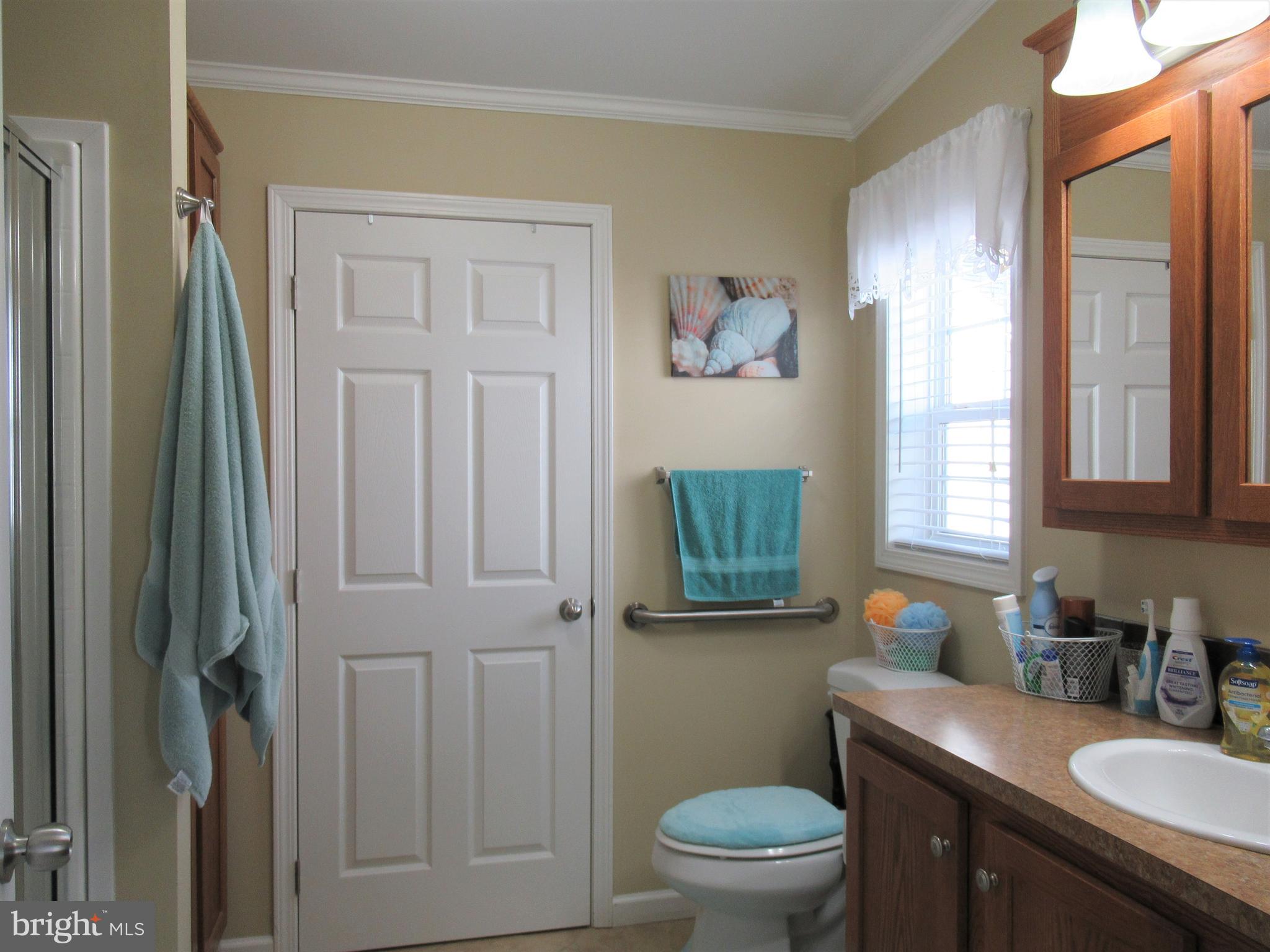 115 Clamshell Road Ocean City, MD 21842 - Photo 24 of 50 Master bathroom-has walk-in closet
