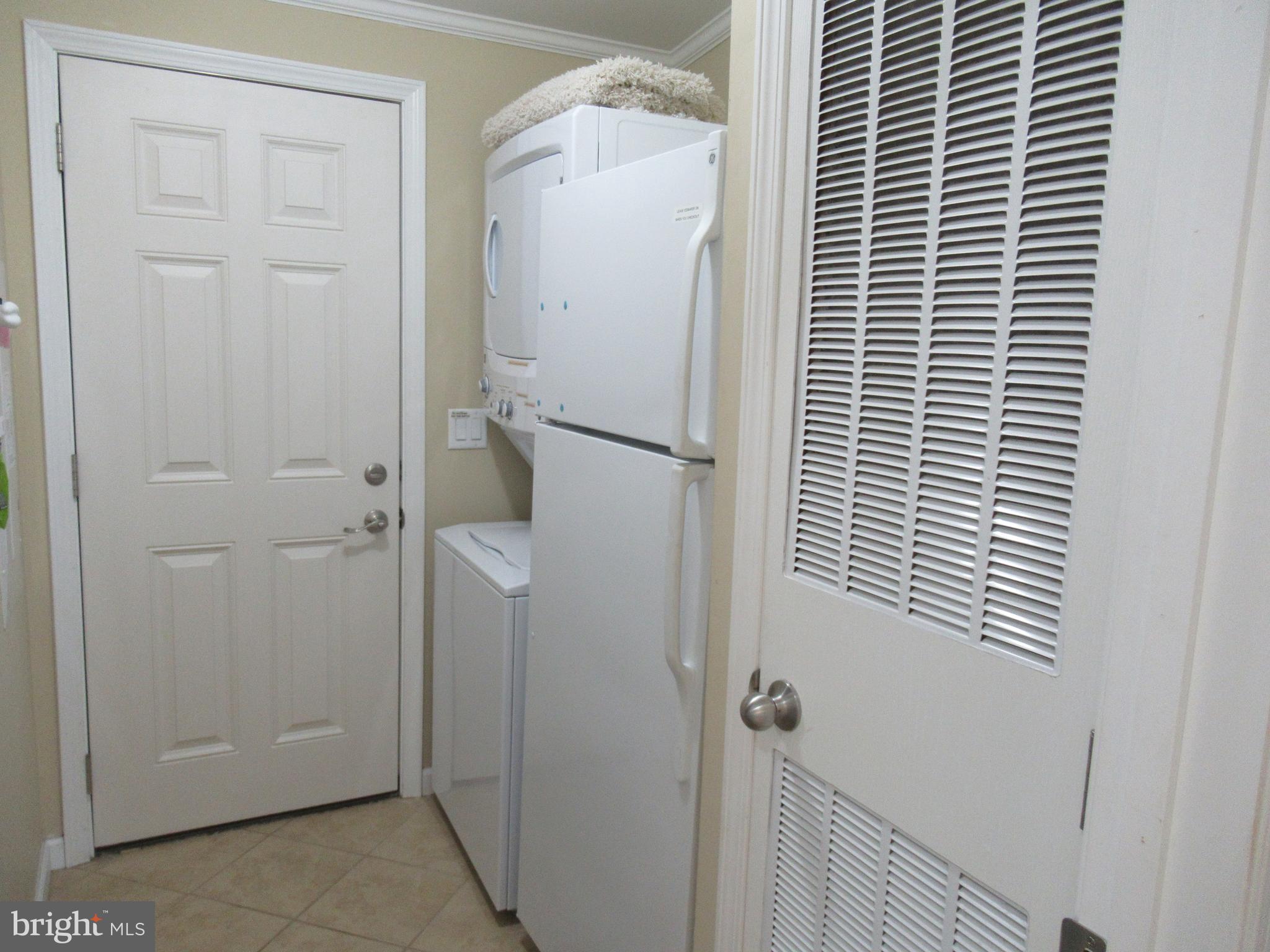 115 Clamshell Road Ocean City, MD 21842 - Photo 37 of 50 Laundry room-with side entrance/exit