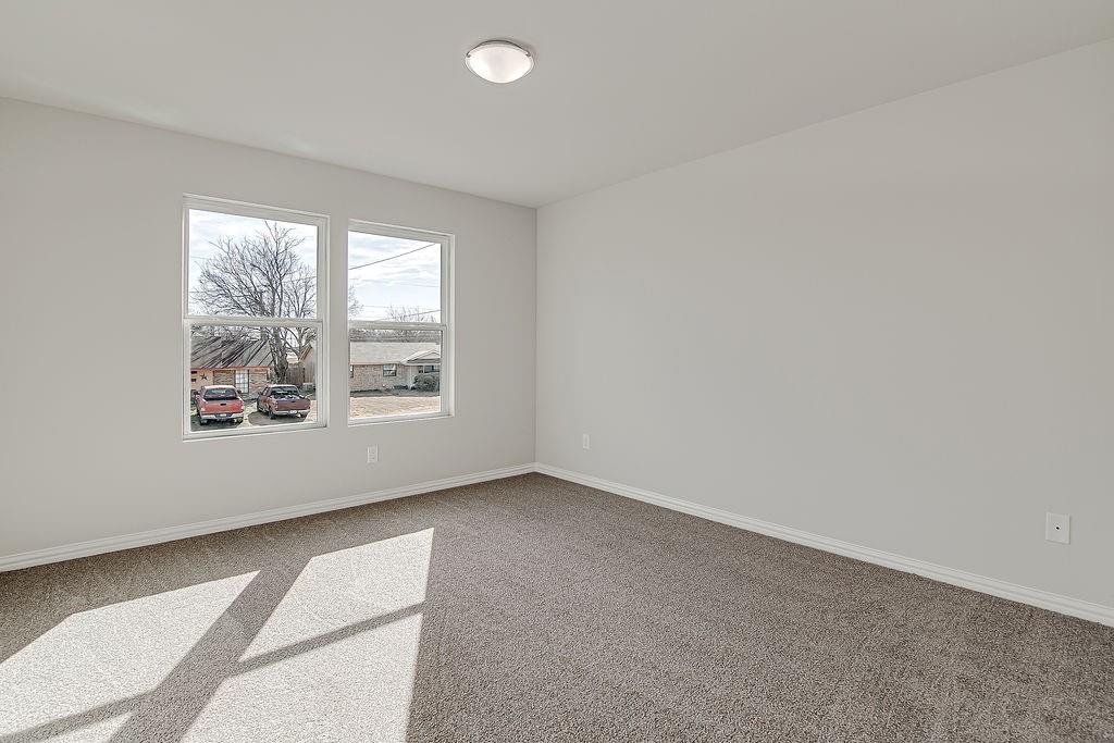 333 North Field Street Burleson, TX 76028 - Photo 15 of 35 an empty room with windows