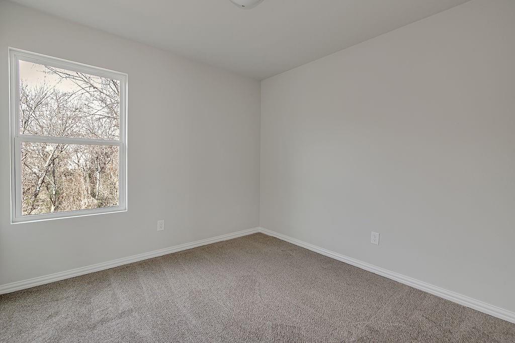 333 North Field Street Burleson, TX 76028 - Photo 18 of 35 an empty room with a window